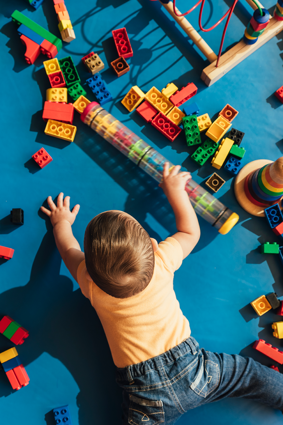 happy-baby-playing-with-toy-blocks-2021-08-28-03-09-57-utc